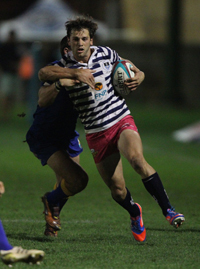 Earned his stripes: Ikeys centre Tiger Bax goes on the rampage against FNB Wits in his last Varsity Cup match. Bax scored two tries, capping off a distinguished career in the blue and white hoops.