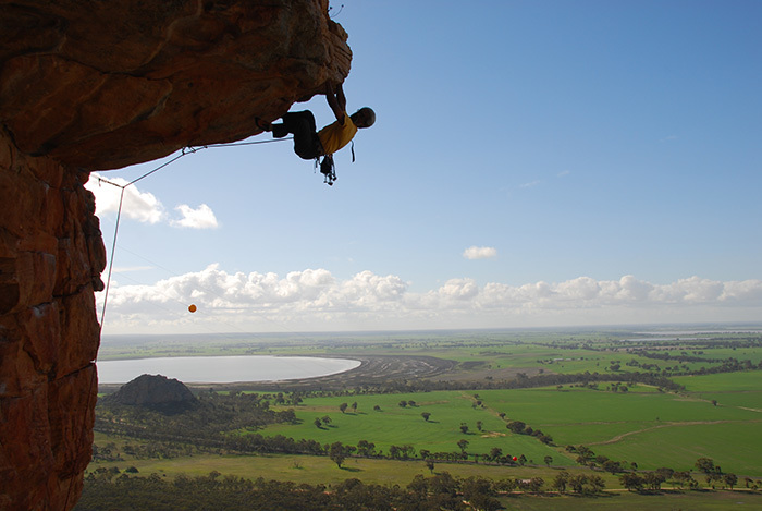 Ed February climbing on Mount Arapiles in Australia.
