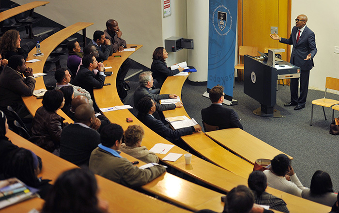 Jimmy Manyi of the Progressive Professionals Forum urges the audience to consider transformation as a fundamental change in which all people and cultures are respected equally. Manyi was one of the panellists at a recent debate hosted by UCT's Transformation Services Office. 