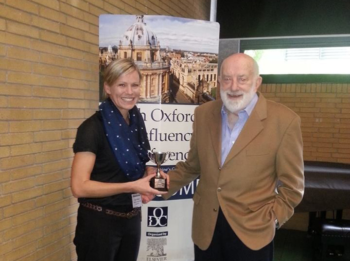 International honour: Travers Reid (right) presents the award, which includes prize money of Â£300 (R5&nbsp;000) and is named after him, to Freda Walters for her research into ways to prevent stuttering children from being bullied.