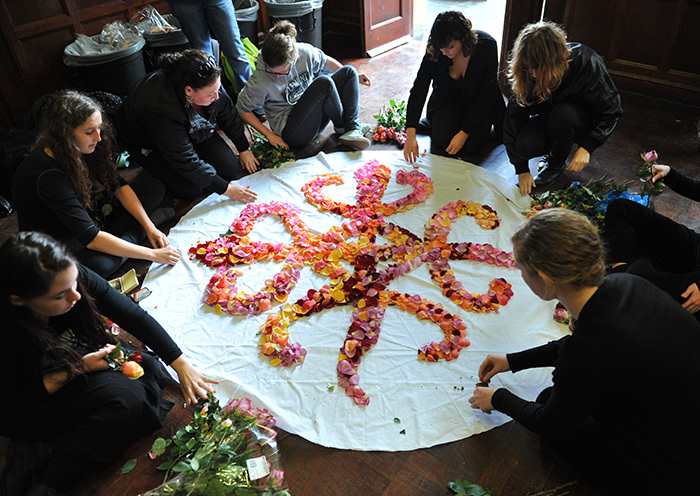 A performance piece by first-year Michaelis students, where torn rose petals were reconfigured into the Ghanaian symbol of unity.