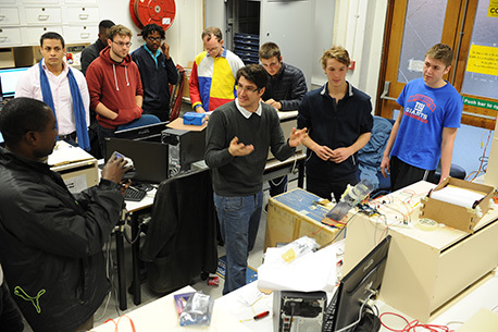 Riccardo Vernetti (speaking), Oliver Funk and Oliver de Bruin explain their recycling design project using an Intel Galileo Board, as part of the Department of Electrical Engineering's Innovation Week. UCT is part of Intel's global roll-out of 50 000 Galileo boards to 1 000 universities in the next 18 months.