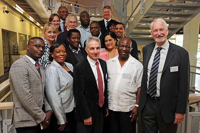 Vice-Chancellor Dr Max Price (centre) pictured here with some UCT researchers and members of the Parliamentary Portfolio Committee on Science and Technology.
