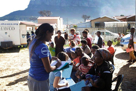 A SHAWCO speech therapist screening potential patients.