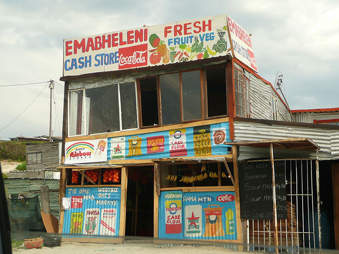 A shop in Khayelitsha, a South African township, displays a linguistic mix of English and isiXhosa.