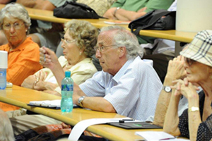 Oiling the cogs: Students get stuck into a stimulating discussion at the 2012 Summer School, and the 2014 season promises more of the same, with a vast range of short courses and lectures on offer.