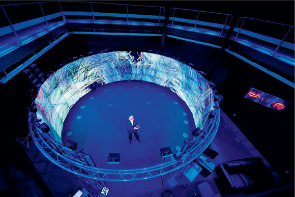 Professor Paul Bonnington of Monash University in the Monash CAVE2 (TM), which is used to visualise big data. (CAVE2 is a trademark of the University of Illinois Board of Trustees.) Image: Paul Jones, Coretext.