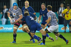 No stopping him: UCT's powerhouse lock Shaun McDonald (carrying the ball) keeps his cool under pressure from Wits defender Ashley Kohler in the Ikeys' 25-5 win in Johannesburg on Monday evening.