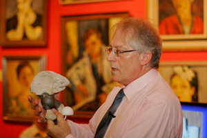 Metal skeleton: Dr George Vicatos demonstrates a titanium-based implant to a human skeleton at the CafÃ© Scientifique event in January.