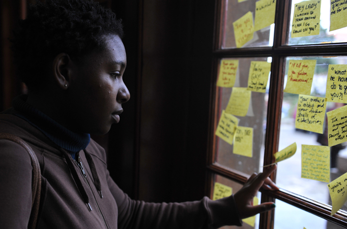 As part of a 2014 collaboration between Michaelis School of Fine Art and university's HIV/AIDS, Inclusivity and Change Unit (HAICU), first-year students staged an exhibition looking at social justice issues, many of them to do with gender. One group in particular asked members of the UCT community to write down their reactions to inappropriate or disrespectful comments (as well as the comments themselves) on sticky notes, and the notes were pasted on the windows of the Molly Blackburn Hall (seen here). Photo by&nbsp;Je'nine&nbsp;May.