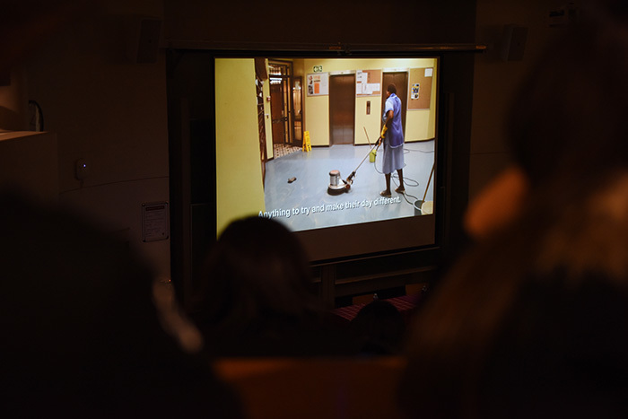 Students and workers watch the documentary Mamma Aggie at a recent worker's appreciation lunch.