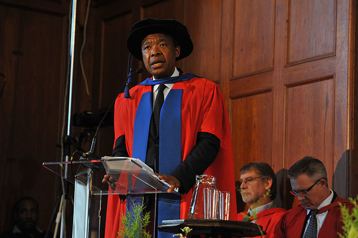 Okwui Enwezor, honoured for his exceptional contribution to the international promotion of modern and contemporary African art, addresses arts and science graduands at the last of the June graduation ceremonies.