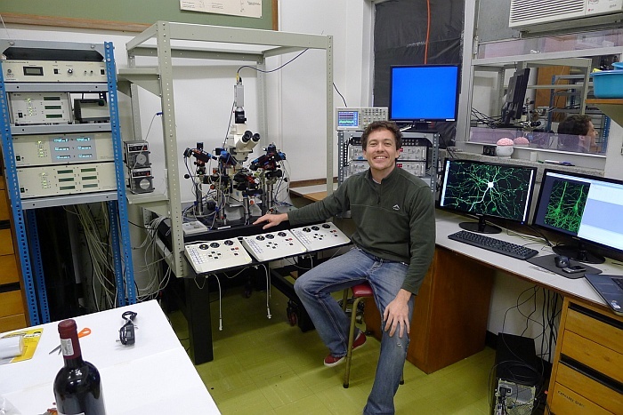 Brain waves: Dr Joseph Raimondo in the laboratory housing the patch-clamp equipment donated by alumnus Prof Henry Markram. The gift will grow basic neuroscience research in the health sciences faculty, and will allow researchers to 'listen in' on the brain's electrical communications.