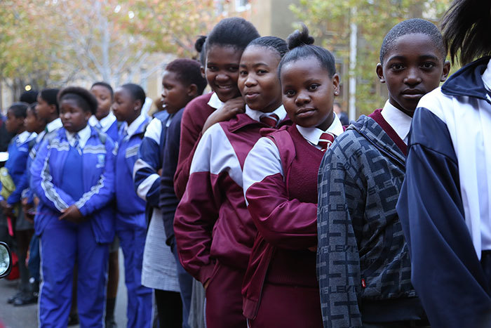 Excitement builds among entrants as they line up on University Avenue to register for the UCT Mathematics Competition.