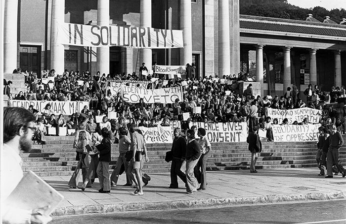 The 1976 Soweto uprising was a pivotal time in the country's history. Here students gather on Jammie Steps to show their solidarity, calling for an end to police brutality and Afrikaans as a medium of instruction in schools. (Photo courtesy of UCT Libraries' Special Collections and Archives.)