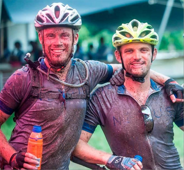 Pictured above are Absa Cape Epic Team Nexus, Marc Brighton and bike partner Steven Mitchel (left) after an incredibly muddy Sabrina Love Challenge MTB race in 2014 in Plettenberg Bay.
