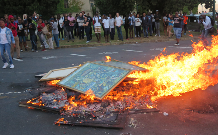 Protestors burning art on 16&nbsp;February 2016 at UCT.