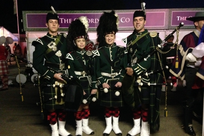 Michael-Jon (MJ) Rosslee (honours, infectious diseases and immunology), Caitlin Foley (first year, physiotherapy), Amber Vogel (first year, mechanical engineering) and Andrew de Blocq (master's, biological sciences) in full dress during their rehearsal for Queen Elizabeth's birthday party celebrations.