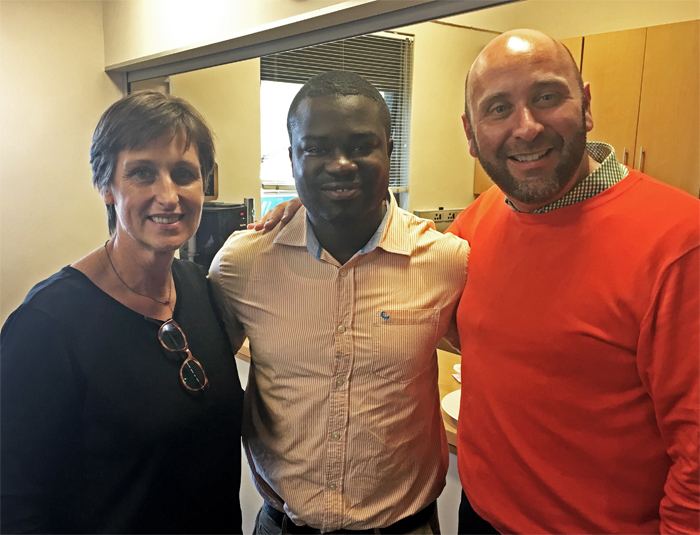 Tafadzwa Tivaringe, centre, flanked by Kathy Erasmus on his right, who introduced him to the MMUF programme, and David Casey, who heads UCT's Careers Services.