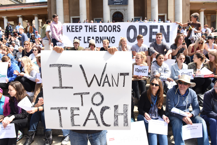 UCT staff and students gathered for a silent protest on the Jammie plaza at noon on Friday under the banner 'Keep the doors of learning open'. This was ahead of the planned reopening of campus on Monday, 3 October.