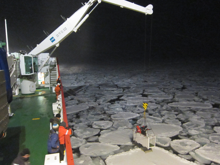 Braving the chill, team members were at their icy coolest when collecting frazil from the ocean's surface.