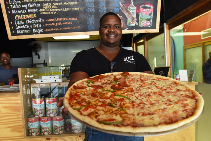 Andri Ntema, UCT BSc student and co-founder of Slice Pizza, the newest pizza place in Long Street.