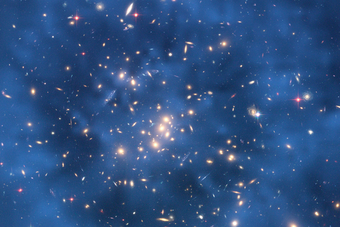 Image taken from the Hubble Space Telescope indicating that a huge ring of dark matter likely exists surrounding the centre of CL0024+17 that has no normal matter counterpart.