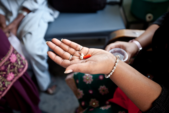 A patient receives her treatment at the civil hospital in Jalhandar, India, as part of the country's Revised National Tuberculosis Control Programme. Photo <a href="www.flickr.com/photos/ifrc/6853404384/" target="blank">Benoist Carpentier / IFRC</a>.