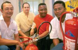 Coming to the aid of the party: Quick thinking and action by (from left) Noel Markgraaff, Hiram Arendse, Dr Deon Bezuidenhout and James Mowers made sure that a recent fire in the Polymer Sciences Laboratory did minimal damage.