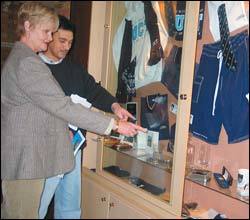 Check it out: Brain Books' manager Zaki Sallie and health sciences alumni officer Joan Tuff show off the new display cabinet in the Barnard Fuller entrance, packed with branded UCT goods to order or for sale every Wednesday.