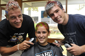 All gone: Kopano Residence held a Shavathon to raise money for cancer research. Scott Havemann and Murray Beaumont admire the close crop they gave Kath Fennemore.