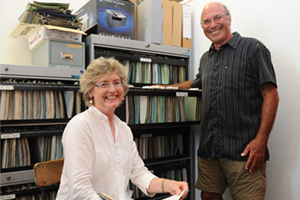 <b>Giving back:</b> Drs Selig Leyser and Clare Roberts examine old files at the Poisons Information Centre, Red Cross War Memorial Children's Hospital. A medical alumnus, Leyser has designed a new program for the centre, which generates real-time data for the team, easing their load and increasing efficiency.