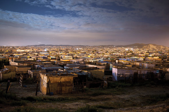 Light changing over Enkanini, on the far south-east side of Khayelitsha. Photo by David Harrison.