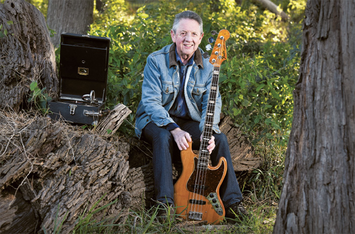 Rockabilly baby: Julian Mayer (64) weekend muso, guitarist (with his 1972 Fender Jazz bass and 1920 His Master's Voice gramophone), collector and principal technical officer in mechanical engineering. Photographed above Madiba Drive, upper campus.