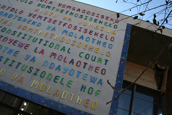 The Constitutional Court, where the old prison was integrated into the space as a way of remembering the past. Photo by Andre-Pierre from Wikimedia Commons.