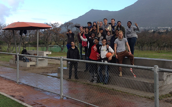 During the June 2015 vacation, architecture students along with key staff members and residents of Imizamo Yethu helped&nbsp;to&nbsp;build&nbsp;a&nbsp;watering&nbsp;point and seating platform for the football field. Photo supplied.