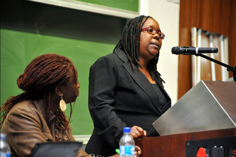 Making a stand: Virginia Muwanigwa speaking at the second 'To Whom does Africa Belong' debate. Seated is Selina Mudavanhu, a doctoral student at UCT's Centre for Film and Media Studies who chaired the debate.