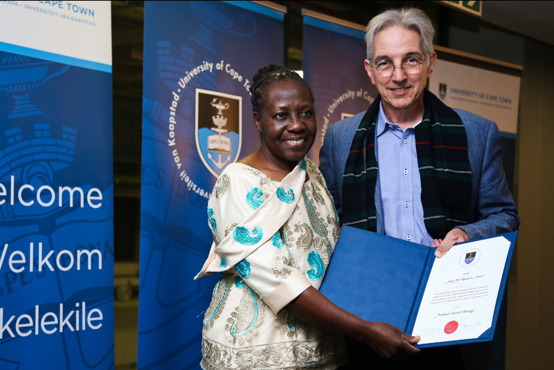 Prof Chuma Himonga receives the Alan Pifer Award from Vice-Chancellor Dr Max Price. Himonga was recognised for nearly 40 years of researching customary law.