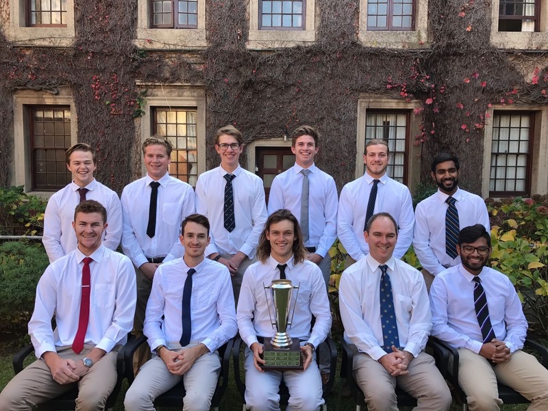 The UCT Cricket Club committee with their Club of the Year trophy.