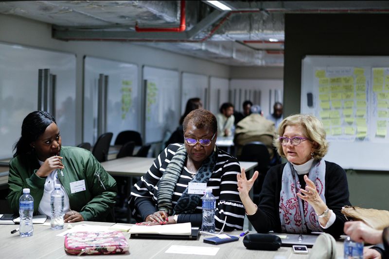 Karin Ireton explains her point at a discussion on putting into operation the UN Global Sustainable Development Goals. Also in picture are table facilitator Cecilia Kinuthia-Njenga (middle), head, United Nations Environment Programme (UNEP) South Africa, and Cynthia Tsunyana, Ensight Energy Solutions.