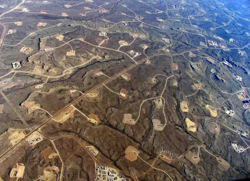 An aerial view of gas wells in Wyoming. <b>Photo</b> Bruce Gordon for <a href="http://ecoflight.org/index.php?mact=eco_gallery,cntnt01,default,0&amp;cntnt01returnid=42&amp;cntnt01page=3&amp;cntnt01issue=3&amp;cntnt01flight=12" target="_blank" style="font-weight: normal;">Eco Flight</a>.