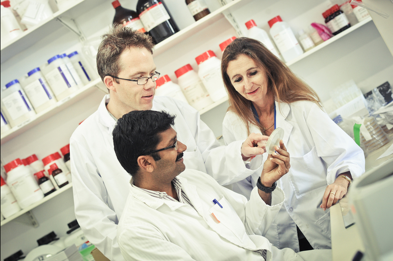 New findings: In the laboratory, Prof Valerie Mizrahi with Drs Digby Warner (middle) and Krishnamoorthy Gopinath, postdoctoral research fellow.