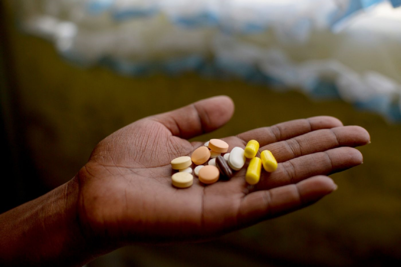 A patient holds her treatment regimen for pre-extensively drug resistant tuberculosis (pre-XDR-TB), which includes delamanid and bedaquiline, in Khayelitsha.