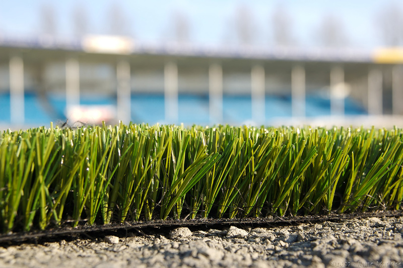 Paved and artificial surfaces &ndash; known to landscaping professionals as &ldquo;hardscaping&rdquo; &ndash; reduce the possibility of water infiltrating the soil and recharging groundwater. <strong>Photo</strong> <a href="https://upload.wikimedia.org/wikipedia/commons/9/9c/Skagerak_Arena_turf.jpg" target="_blank">Wikimedia</a>.