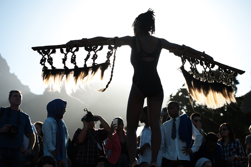 Artist Sethembile Msezane performs at the fall of the Cecil John Rhodes statue on 9 April, 2015. 