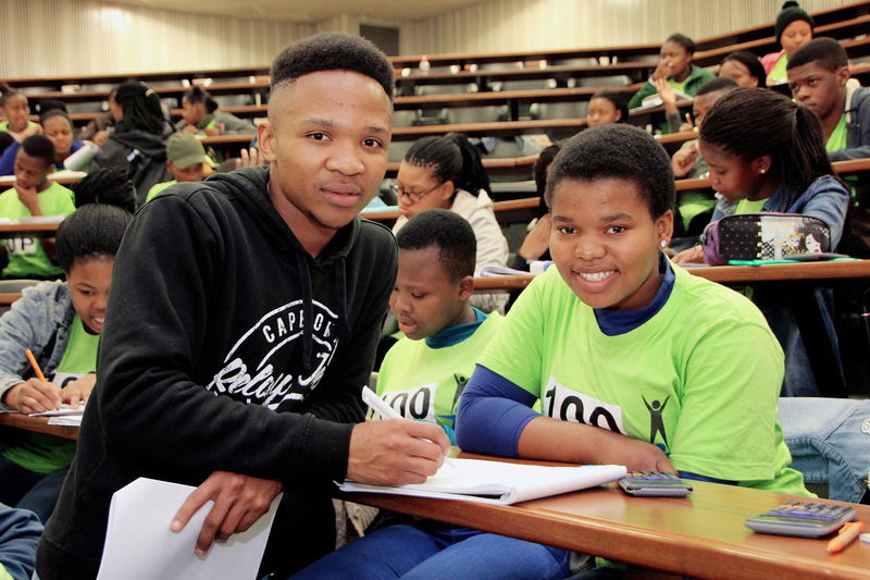 Grade 12 learner Luna Mazwembe gets some one-on-one tuition from mentor Liso Nyandu.