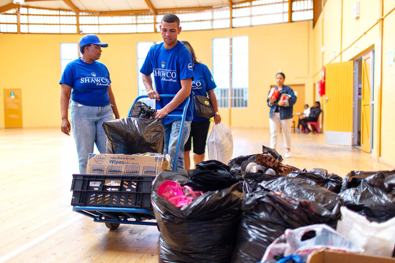 SHAWCO staff deliver desperately needed goods to boost the aid relief effort in Overcome Heights, near Muizenberg, where more than 300 homes were razed by fire.