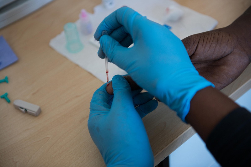 Researchers take a blood sample from one of the patients involved in the PredART trial, which was run at Khayelitsha’s Site&nbsp;B HIV-TB clinic.