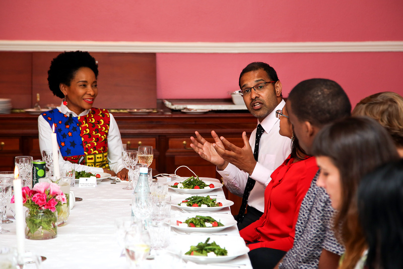 VC Prof Mamokgethi Phakeng looks on as Dr Sahal Yacoob, from the Department of Physics, introduces himself to fellow guests.