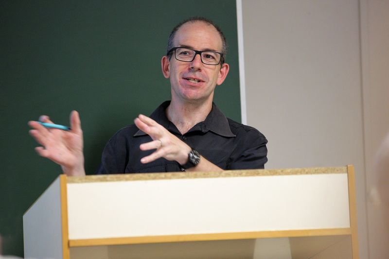 Summer School course presenter Jonathan Ancer, an author and journalist, addresses attendees on the subject of South Africa’s infamous apartheid-era spies.